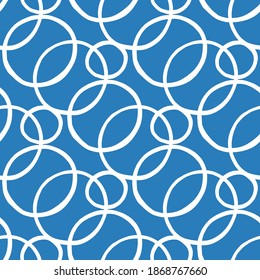 Vector seamless pattern, texture background. Hand drawn and white colored circles on blue.