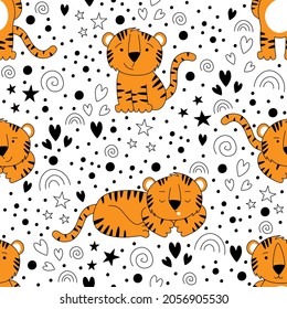 Vector seamless pattern with tiger cubs and various black elements on a white background. The symbol of the new year 2022.