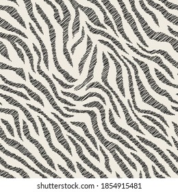 Vector seamless pattern with tiger spots. Endless stylish texture. Ripple scribble repeating background. Natural stylish spotty animal print. Can be used as swatch for illustrator.
