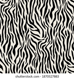 Vector seamless pattern with tiger spots. Endless stylish texture. Diagonal striped repeating background. Natural stylish spotty animal print. Can be used as swatch for illustrator.