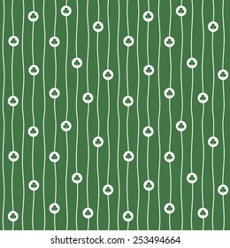 Vector seamless pattern with tiny shamrocks and endless wavy vertical stripes.