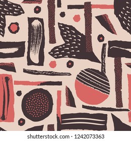 Vector seamless pattern. Torn paper decorated paint and ink spots. Different shapes with rough ribbed and jagged edges. Grunge texture. Applique of scraps with stains. Wallpaper, wrapping, textile