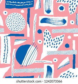 Vector seamless pattern. Torn paper decorated paint and ink spots. Different shapes with rough ribbed and jagged edges. Grunge texture. Applique of scraps with stains. Wallpaper, wrapping, textile