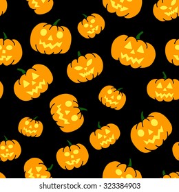 Vector seamless pattern with traditional carved pumpkins. Perfect background for your Halloween design.
