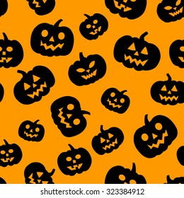 Vector seamless pattern with traditional carved pumpkins. Perfect background for your Halloween design.