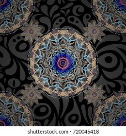 Vector seamless pattern of traditional ornamental background with pink, orange and violet circular mandala, stars and snowflakes elsments on a black backdrop.