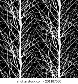 Vector seamless pattern with trees silhouettes in black and white colors for fall winter fashion or Christmas wrapping paper