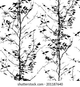 Vector seamless pattern with trees silhouettes with falling leaves in black and white colors for fall winter fashion or Christmas wrapping paper