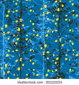 Vector seamless pattern with trees silhouettes with falling leaves in black, blue and yellow  colors for fall winter fashion or Thanksgiving wrapping paper
