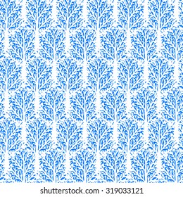 Vector seamless pattern with trees silhouettes and branches in blue and white colors for fall winter fashion or Christmas wrapping paper. Chic, elegant, natural print with woods. Retro style wallpaper