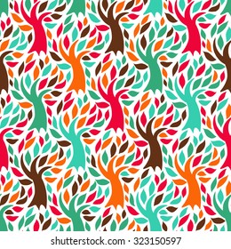 Vector seamless pattern with trees silhouettes and leafs in variety of colors for fall winter fashion or Christmas wrapping paper. Chic, elegant, natural print with woods. Retro style floral wallpaper