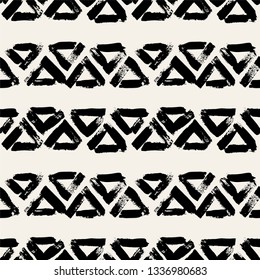 Vector seamless pattern with triangles. Abstract modern background. Monochrome texture from brush strokes. Hipster stylish design.