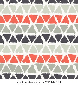 Vector seamless pattern with triangles. Abstract background. Colorful texture from brush strokes