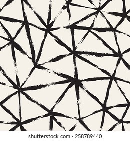 Vector seamless pattern with triangles. Abstract hand made background. Monochrome texture from brush strokes. Irregular triangular grid. Trendy hipster print. Modern graphic design.