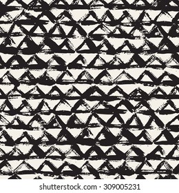 Vector seamless pattern with triangles. Abstract modern background. Monochrome texture with brush strokes. Hipster stylish design.