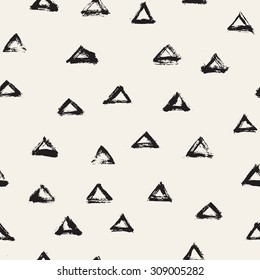 Vector seamless pattern with triangles. Abstract modern background. Monochrome texture with brush strokes. Hipster stylish design.