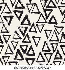 Vector seamless pattern with triangles. Abstract modern background. Monochrome texture from brush strokes. Hipster stylish design.