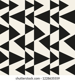 Vector seamless pattern with triangles of different sizes.Modern stylish texture