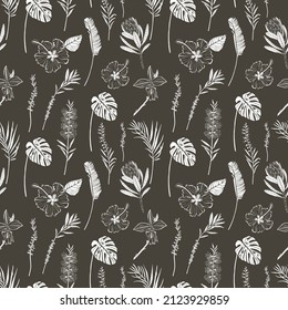 vector seamless pattern with tropical flowers and leaves on a dark background.