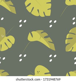 Vector seamless pattern with tropical leaves on a dark background.