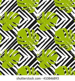 Vector seamless pattern with tropical leaves