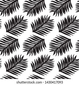 Vector seamless pattern. Tropical palm leaves of African jungle.