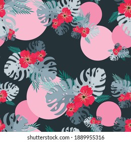 Vector seamless pattern with tropical plant leaves, red hibiscus flowers on dark with pink circles background.