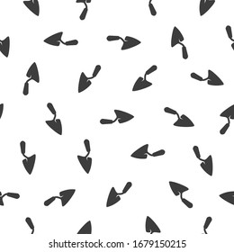 Vector seamless pattern of  trowels on white background