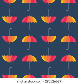 Vector seamless pattern from umbrellas. Abstract seamless pattern design. Rainbow color umbrellas on blue background.