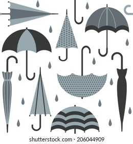 Vector seamless pattern with umbrellas and raindrops