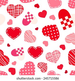 Vector seamless pattern with Valentine's day red and pink hearts on white.