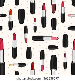 Vector seamless pattern with varicolored lipsticks and caps of different size rotated in different directions on beige background with polka dot