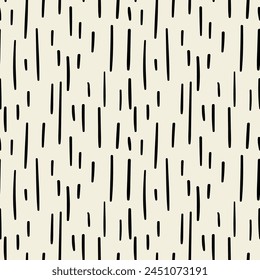 Vector seamless pattern of vertical hand drawn dashes. Repeating texture with doodle lines.
