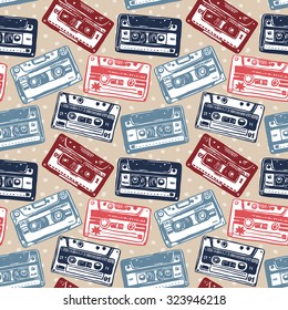 Vector seamless pattern with vintage cassettes, tapes,  old music. 