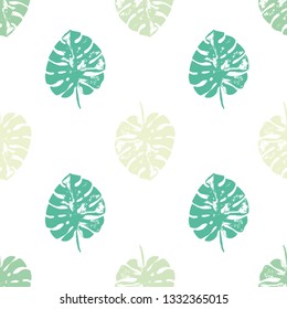 Vector seamless pattern wallpaper of green and turquoise tropical leaves of palm trees on a white background. Tropical illustration. Jungle foliage. Cool floral wallpaper