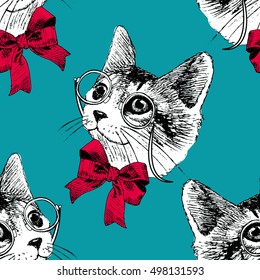 Vector seamless pattern with white cat in a red bow. Green.