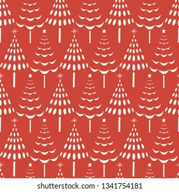 Vector seamless pattern of white Christmas trees on a red background. A surface pattern background pattern ideal for Christmas projects.