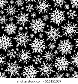 Vector seamless pattern with white Christmas snowflakes on a black background.