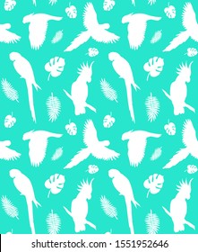 Vector seamless pattern of white different parrot and palm leaves silhouette isolated on green background