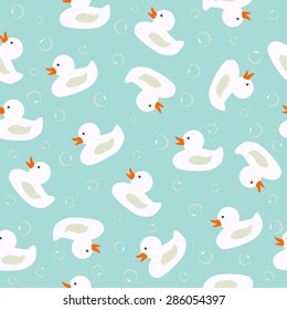 Vector seamless pattern with white ducks and bubbles on blue water. Perfect for background of greeting cards, invitations, baby shower, fabric, scrapbook, baby album.