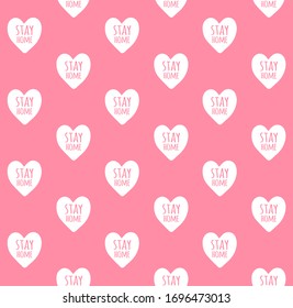Vector seamless pattern of white hand drawn stay home lettering in heart isolated on pink background. Coronavirus pandemic self isolation print illustration