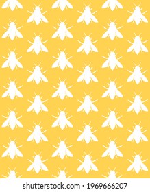 Vector seamless pattern of white hand drawn bee silhouette isolated on yellow background