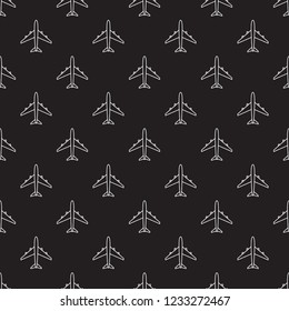 Vector seamless pattern of white outline airplanes on black background. 