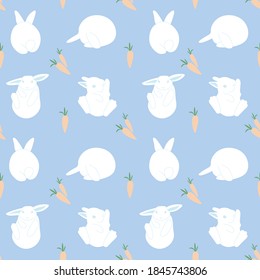Vector seamless pattern with white rabbit and carrots