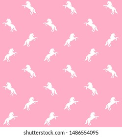Vector seamless pattern of white unicorn silhouette isolated on pastel pink background