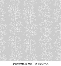 Vector seamless pattern with white vertical branches with leaves on gray background; abstract  natural design for fabric, wallpaper, textile, web design.