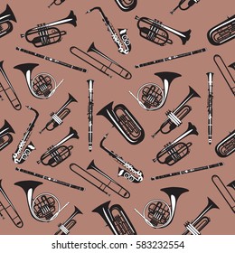 Vector seamless pattern with wind musical instruments. Saxophone, clarinet, trumpet, trombone, didgeridoo, french horn and tuba. Black and white woodwind and brass musical instruments.