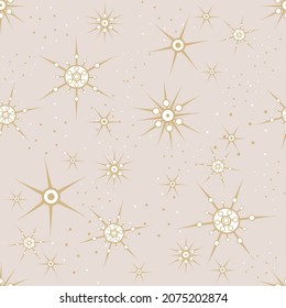 Vector seamless pattern. Winter, pastel background of golden snowflakes of a beautiful form. Christmas festive texture for design cards, posters, holiday invitations, textile, print