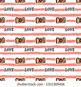 Vector seamless pattern with the word love and doodle camera on striped background. T-shirt and apparel textile design. 