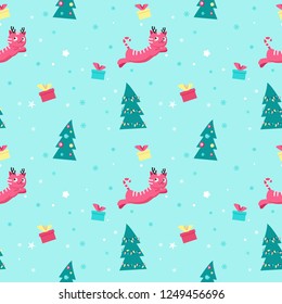 Vector seamless pattern with xmas trees, gift boxes and cute cat with reindeer antler headband on its head. Christmas cats background, wallpaper, fabric, wrapping paper.